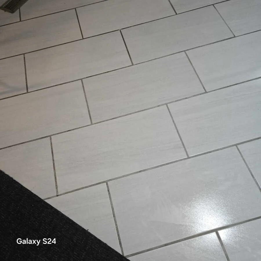 Grout and light floor tiles after deep cleaning, view 2