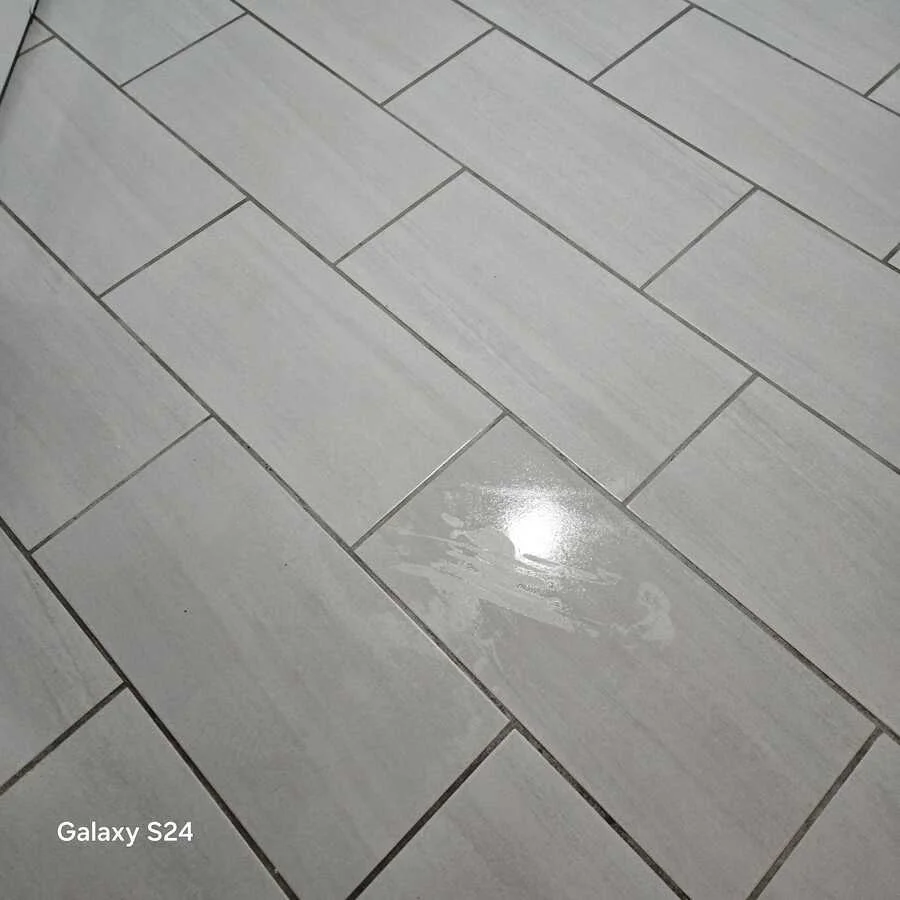 Grout and light floor tiles after deep cleaning, view 3